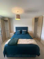 2 single door fitted wardrobes with matching fitted bedsides, fitted in Wynyard